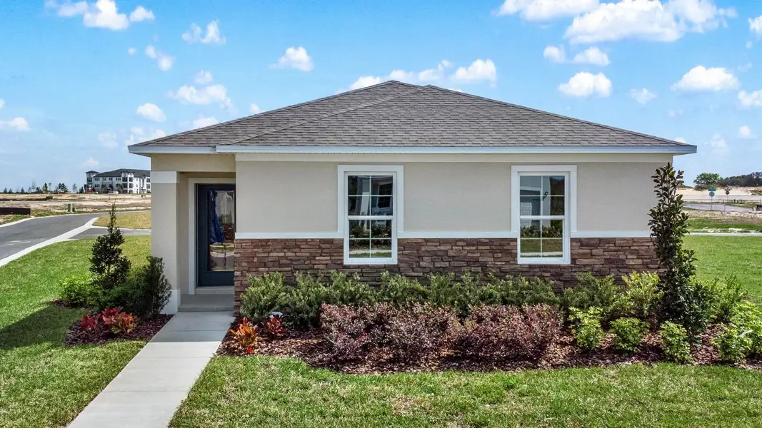 Front exterior of a home in the Kindred community, located in Kissimmee, FL (Image 4).