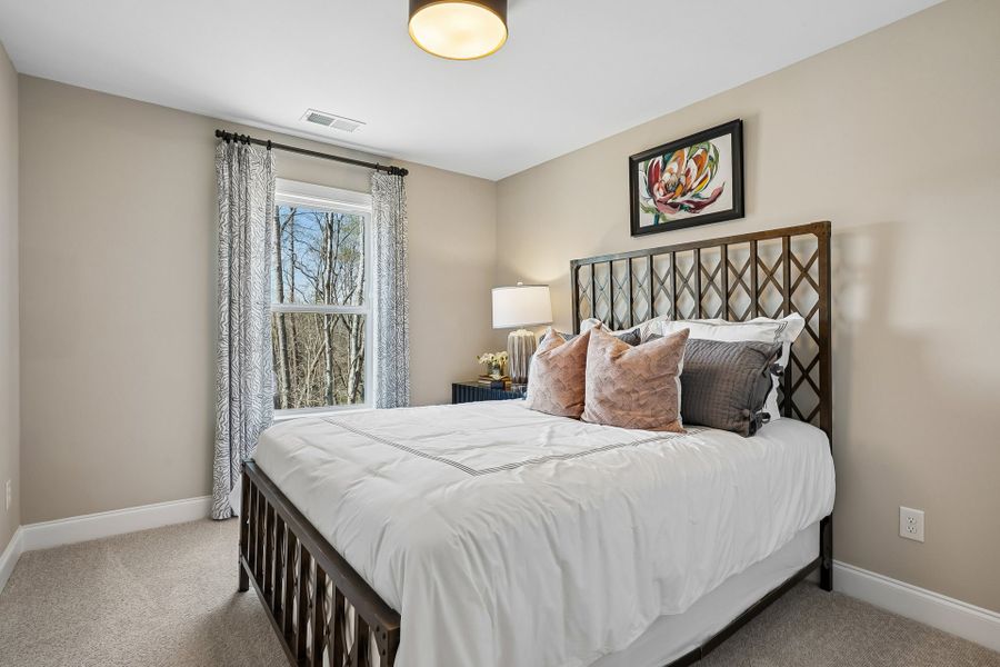 Furnished interior in a model home at Magnolia Acres in Fuquay Varina (Image 25). Furnished interior in a model home at Magnolia Acres in Fuquay Varina (Image 25).