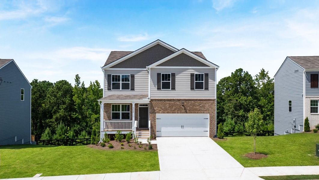 Front exterior of a home in the Oaks at Cedar Grove community, located in Fairburn, GA (Image 5).