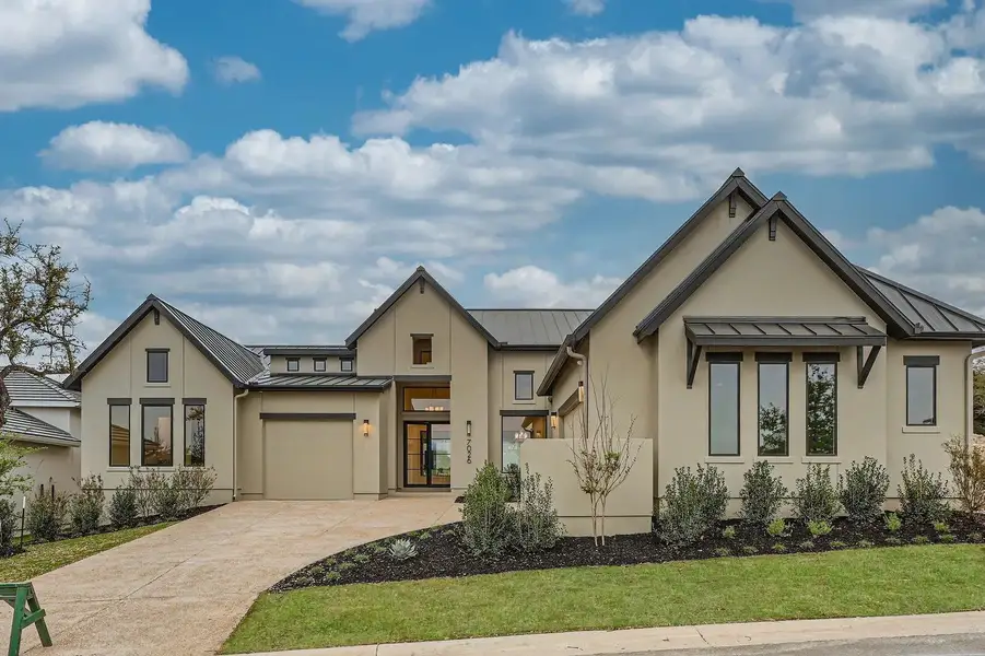 Front exterior of a home in the The Bluff At The Dominion community, located in Shavano Park, TX (Image 3).