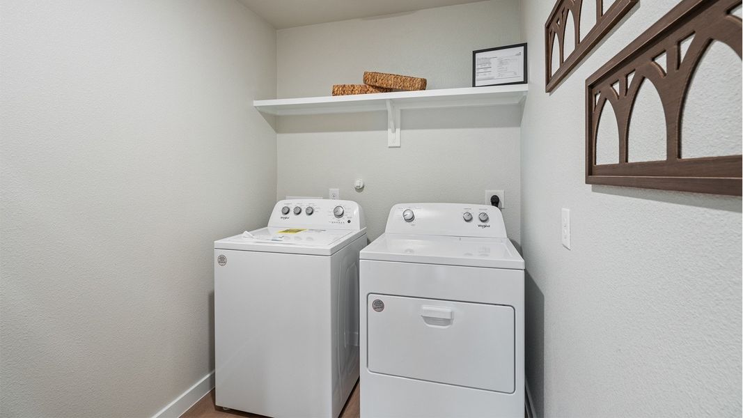 Furnished interior in a model home at Empire Estates in Corpus Christi (Image 28).