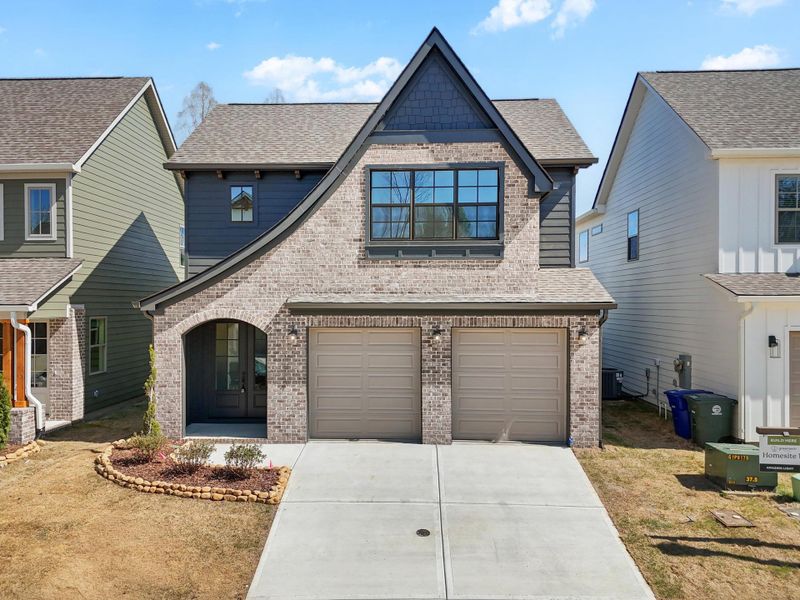 Front exterior of a home in the The Farmstead community, located in Chattanooga, TN (Image 16). Front exterior of a home in the The Farmstead community, located in Chattanooga, TN (Image 16).