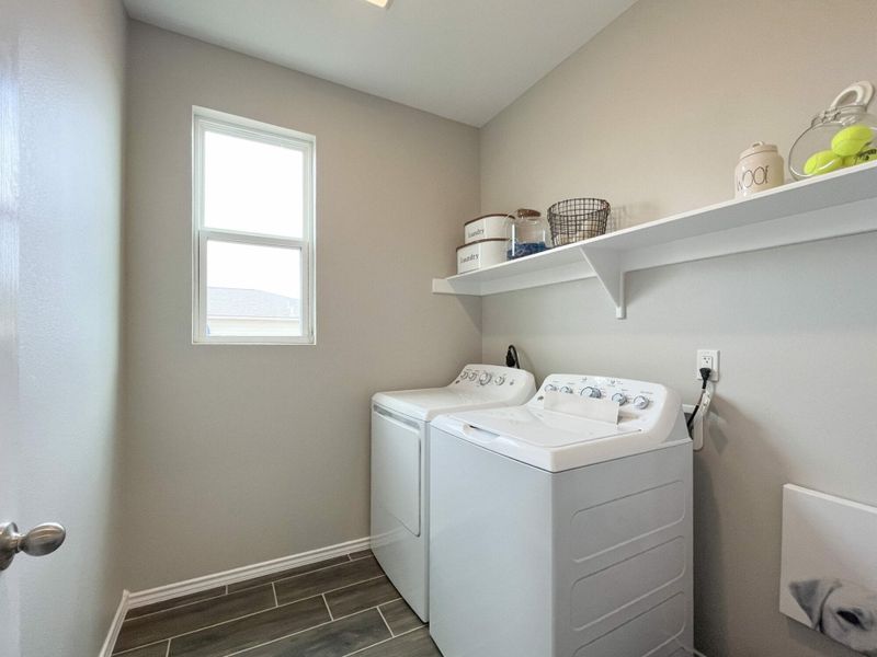 Furnished interior in a model home at Villas San Agustin in Laredo (Image 20).