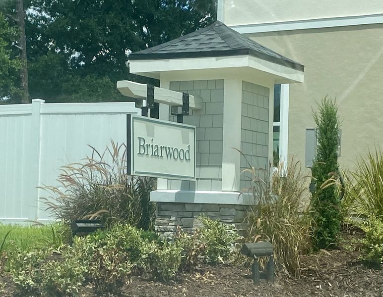 A welcoming entrance with manicured landscaping in Briarwood by D.R. Horton (Jacksonville, FL). A welcoming entrance with manicured landscaping in Briarwood by D.R. Horton (Jacksonville, FL).