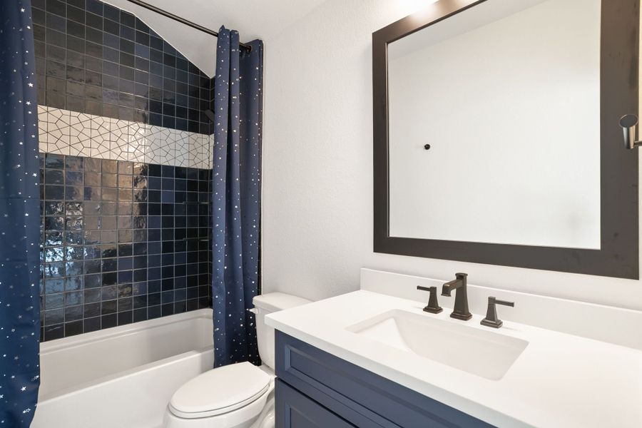 Furnished interior in a model home at Lily Creek at Sutton Fields in Aubrey (Image 71).