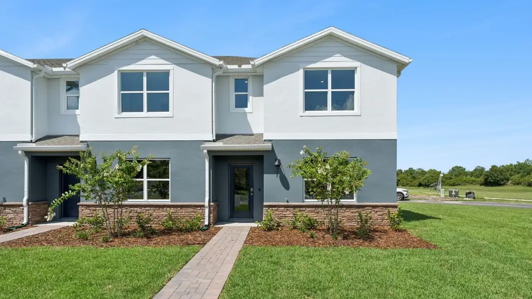 Front exterior of a home in the Fish Lake Cove community, located in Kissimmee, FL (Image 4). Front exterior of a home in the Fish Lake Cove community, located in Kissimmee, FL (Image 4).