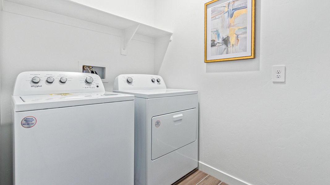 Furnished interior in a model home at Redford Estates in Tucson (Image 30).