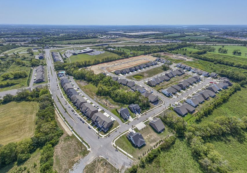 Aerial view of the Kensington Downs Single Family community in Gallatin, TN, showing layout and nearby surroundings (Image 15). Aerial view of the Kensington Downs Single Family community in Gallatin, TN, showing layout and nearby surroundings (Image 15).