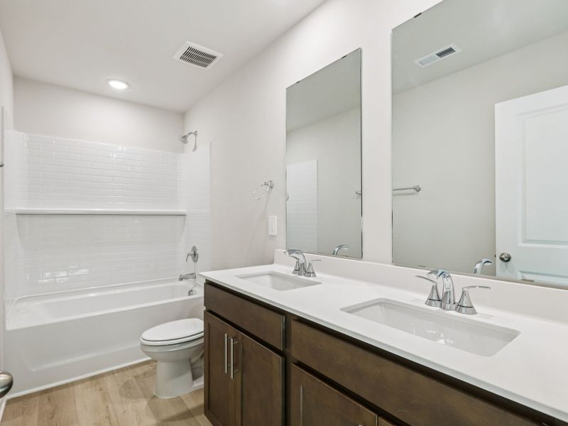 Furnished interior in a model home at Country Lane - Classic Series in Clayton (Image 11).