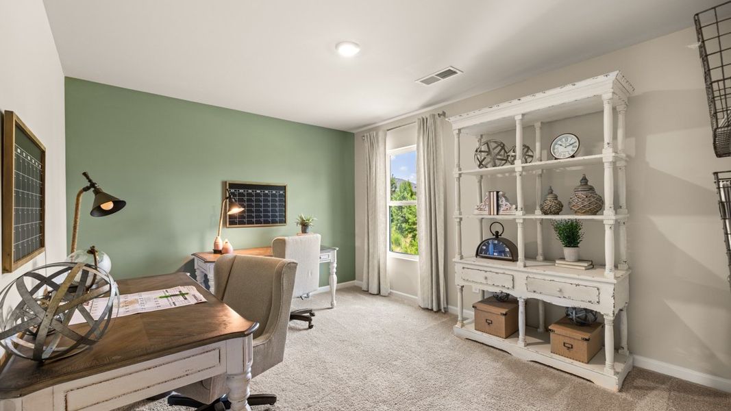 Furnished interior in a model home at Twin Lakes in Hoschton (Image 58).