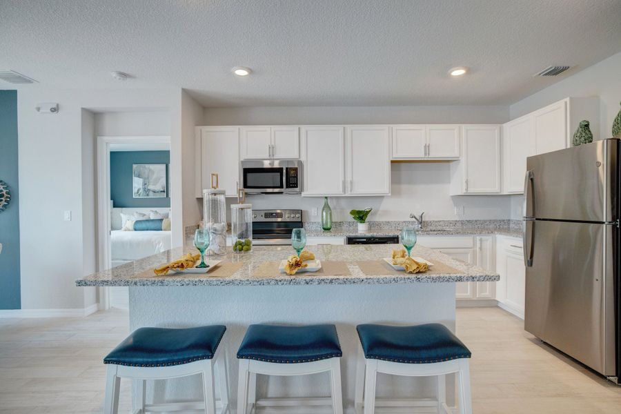 Furnished interior in a model home at Aspire at Waterstone in Fort Pierce (Image 6).