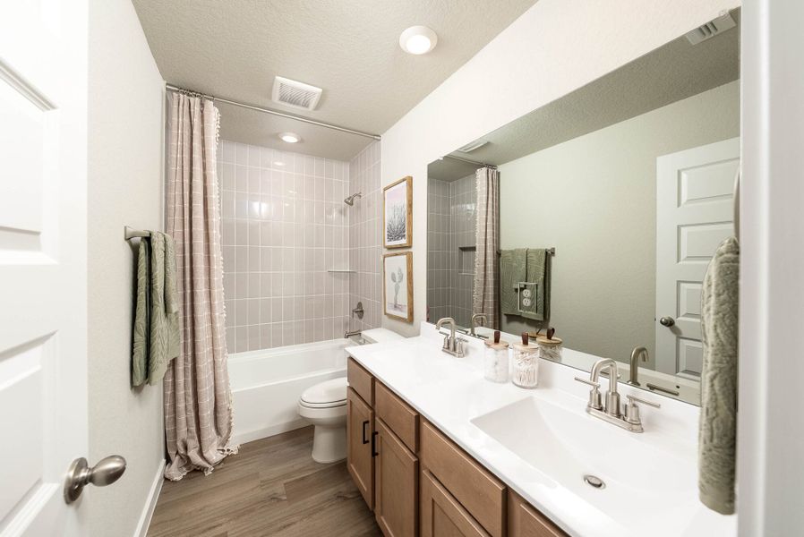 Furnished interior in a model home at Talley Fields in San Antonio (Image 36).