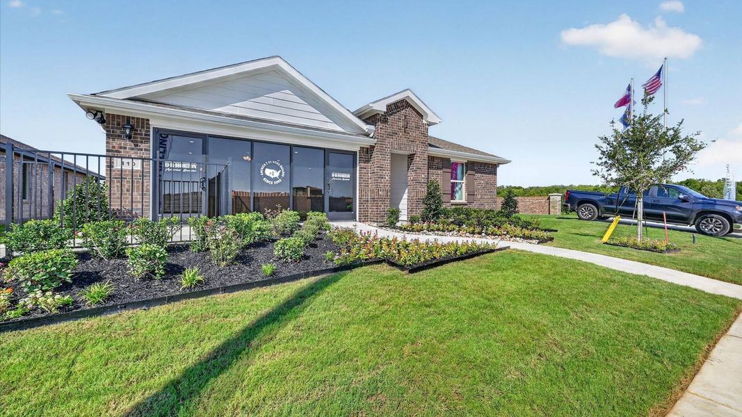 Front exterior of a home in the The Hills at Reunion community, located in Newark, TX (Image 11).