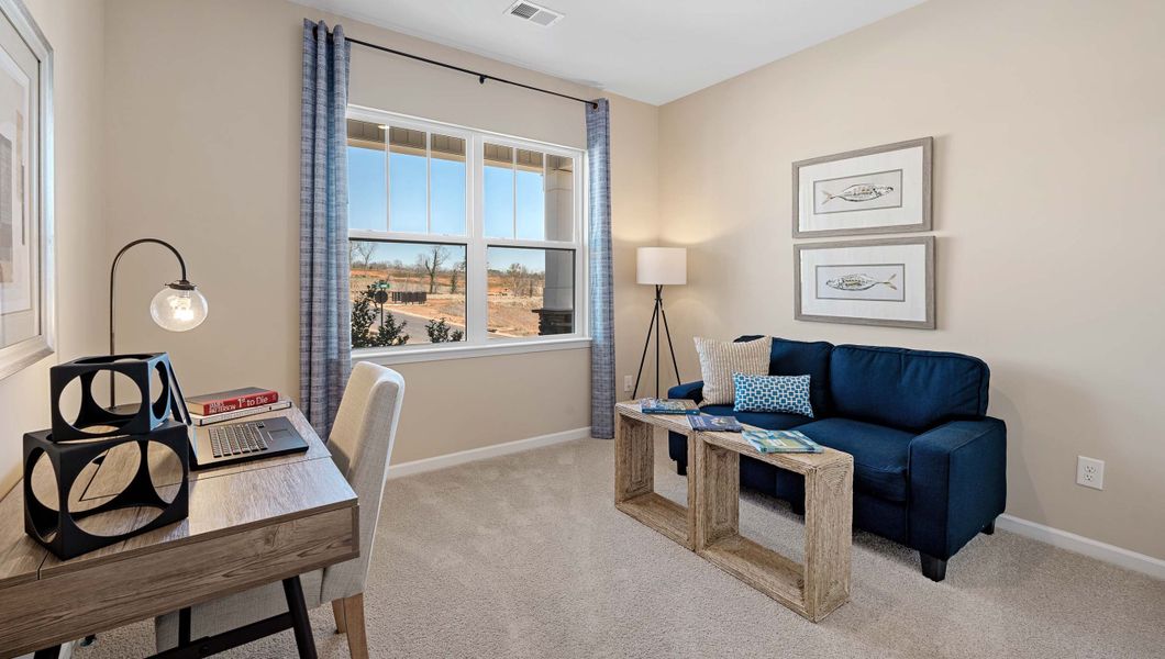 Furnished interior in a model home at Spring Ridge in Anderson (Image 3).