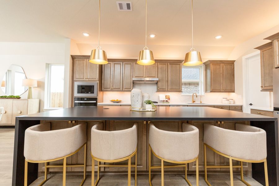 Furnished interior in a model home at ARTAVIA in Conroe (Image 8).