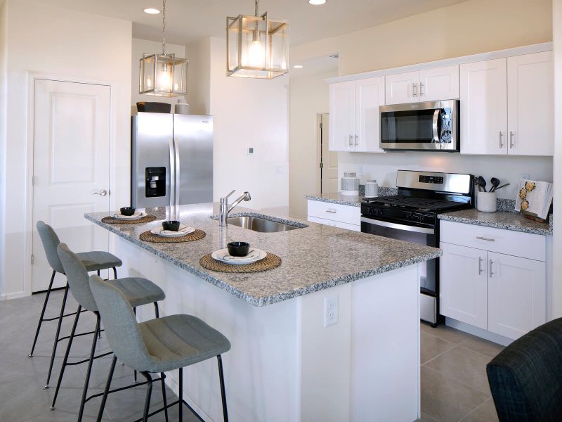 The 1560 plan modeled at Valencia Crossing in Tucson, AZ. The 1560 plan modeled at Valencia Crossing in Tucson, AZ.