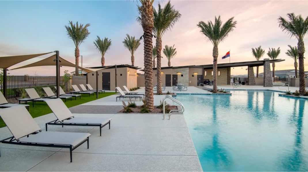 Lounge chairs along the pool's edge