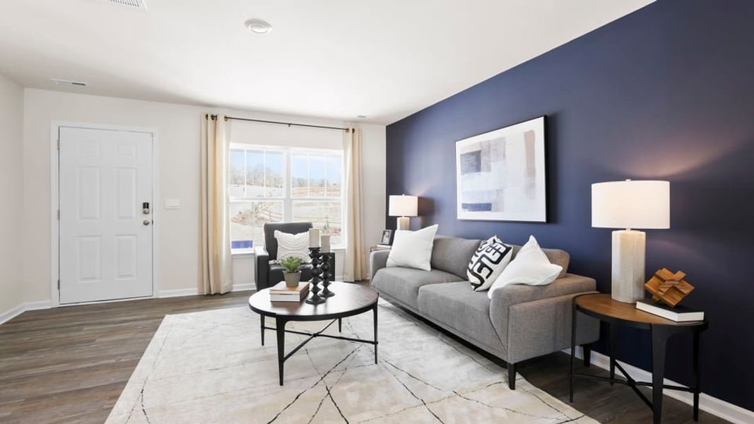 Furnished interior in a model home at Village Grove in Greenville (Image 8).