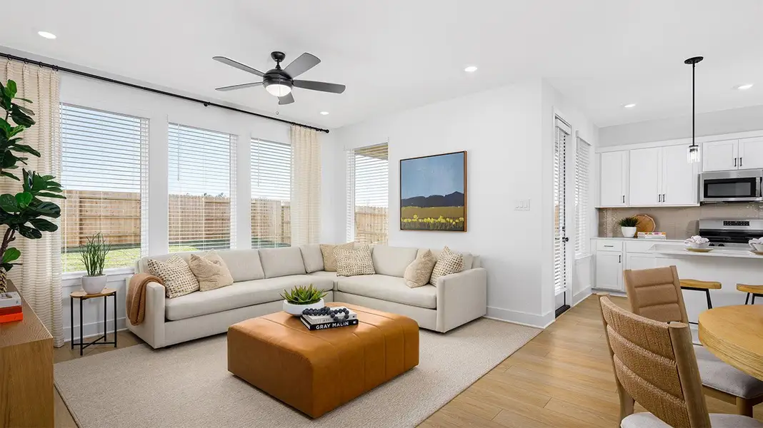 Furnished interior in a model home at The Canopies in Splendora (Image 7).