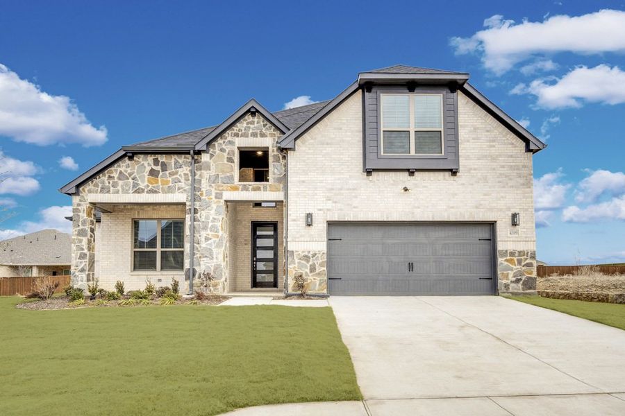 Front exterior of a home in the Westside Preserve community, located in Midlothian, TX (Image 4).