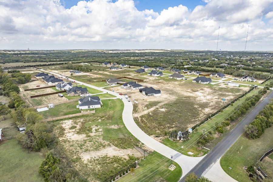 Aerial view of the The Arbors Midlothian community in Midlothian, TX, showing layout and nearby surroundings (Image 12). Aerial view of the The Arbors Midlothian community in Midlothian, TX, showing layout and nearby surroundings (Image 12).