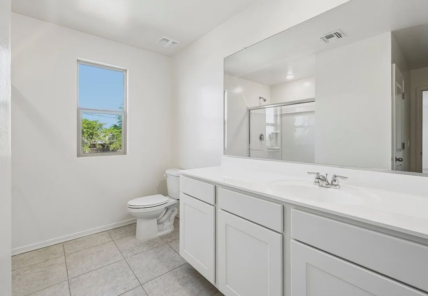 Furnished interior in a model home at Wales Ranch in San Tan Valley (Image 20).