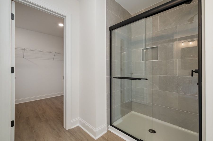 Primary Bath and Walk-In Closet