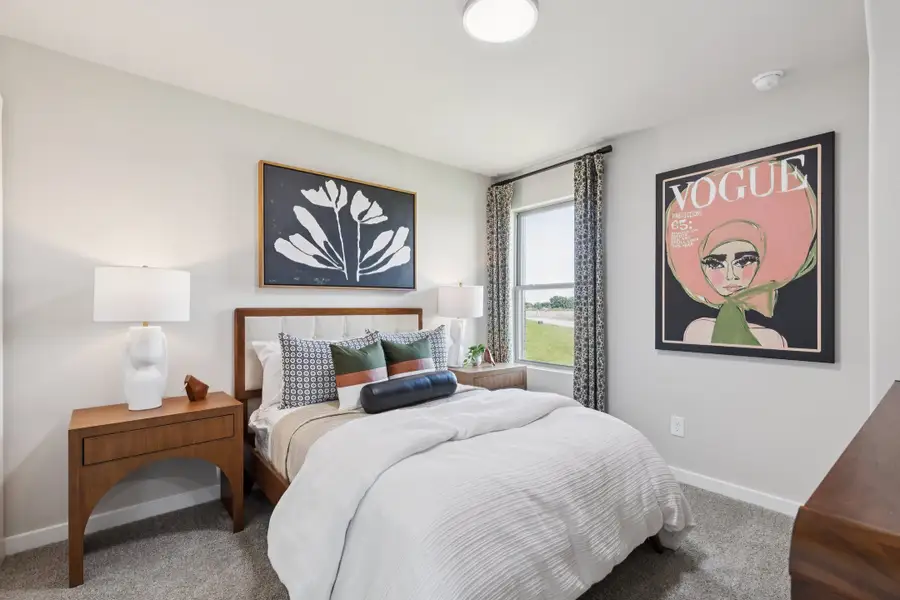 REPRESENTATIVE PHOTO – Bedroom in a Nicholson Ranch new home in Lavon TX by Trophy Signature Homes