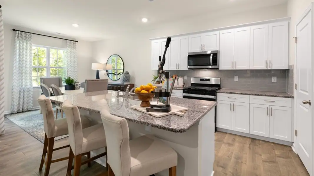 Furnished interior in a model home at Beaver Dam Crossing in Bailey (Image 3).