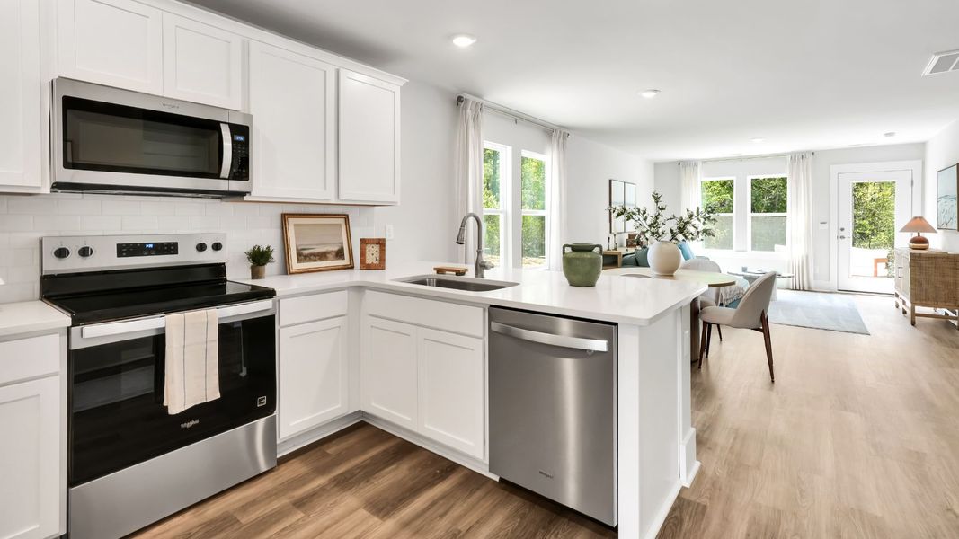 Furnished interior in a model home at The Willows at Blake Farm in Wilmington (Image 7). Furnished interior in a model home at The Willows at Blake Farm in Wilmington (Image 7).