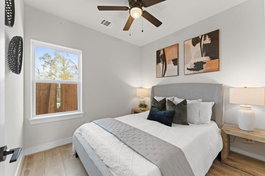 Furnished interior in a model home at Highland Gardens in Houston (Image 31).