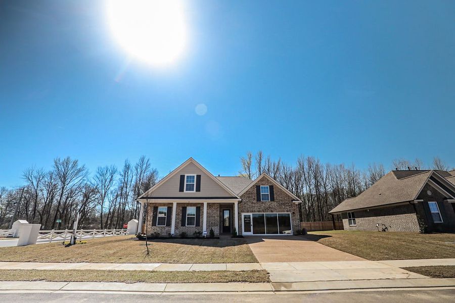Front exterior of a home in the Villages of Green Meadows community, located in Munford, TN (Image 11).