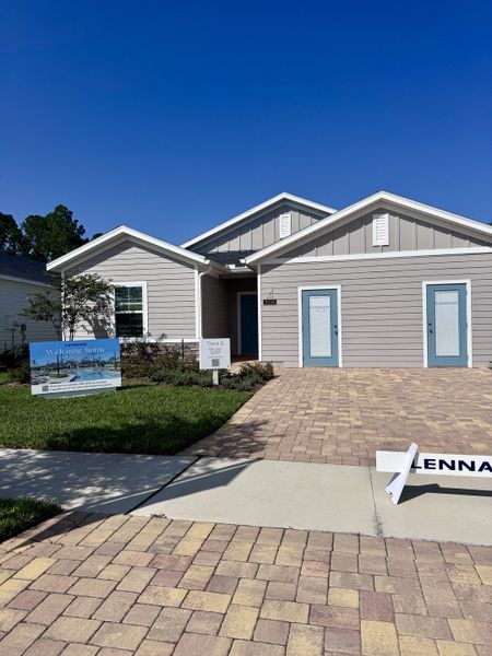 A charming modern home with a stone driveway in Edenbrooke at Hyland Trail by Lennar, Green Cove Springs, FL.