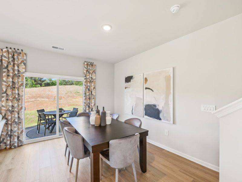 Easily host gatherings in the spacious dining area. Easily host gatherings in the spacious dining area.