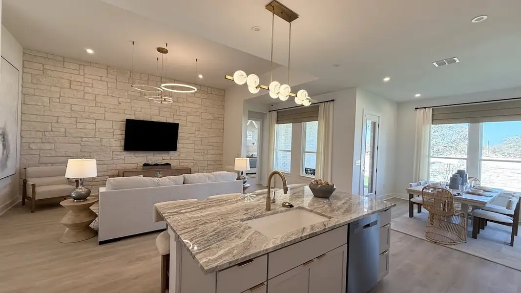 Furnished interior in a model home at Persimmon in Buda (Image 4).
