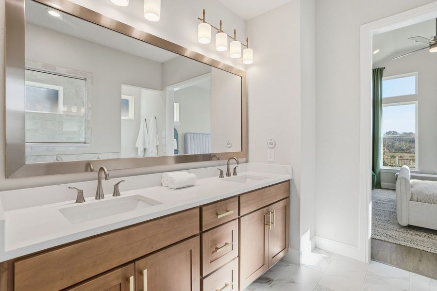 Furnished interior in a model home at Lily Creek at Sutton Fields in Aubrey (Image 57).