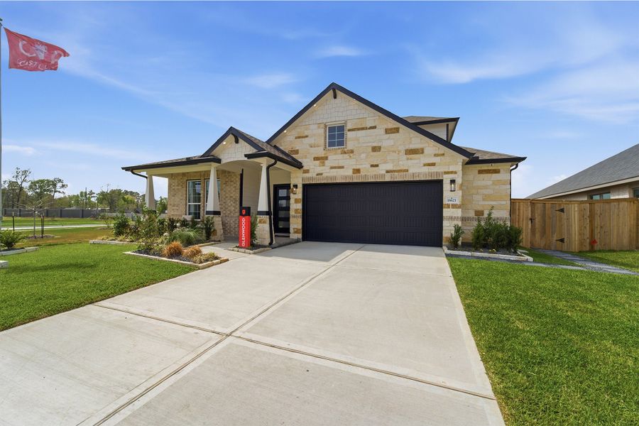 Front exterior of a home in the Sundance Cove community, located in Crosby, TX (Image 2).