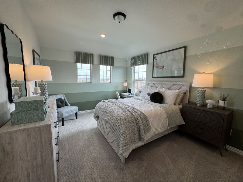 A cozy bedroom featuring striped walls, modern furnishings, and soft lighting, creating a serene and inviting ambiance. A cozy bedroom featuring striped walls, modern furnishings, and soft lighting, creating a serene and inviting ambiance.