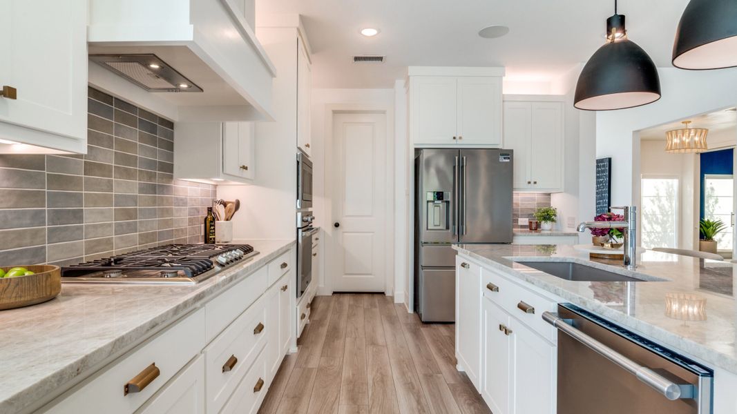 Furnished interior in a model home at Painted Tree - South in McKinney (Image 7).