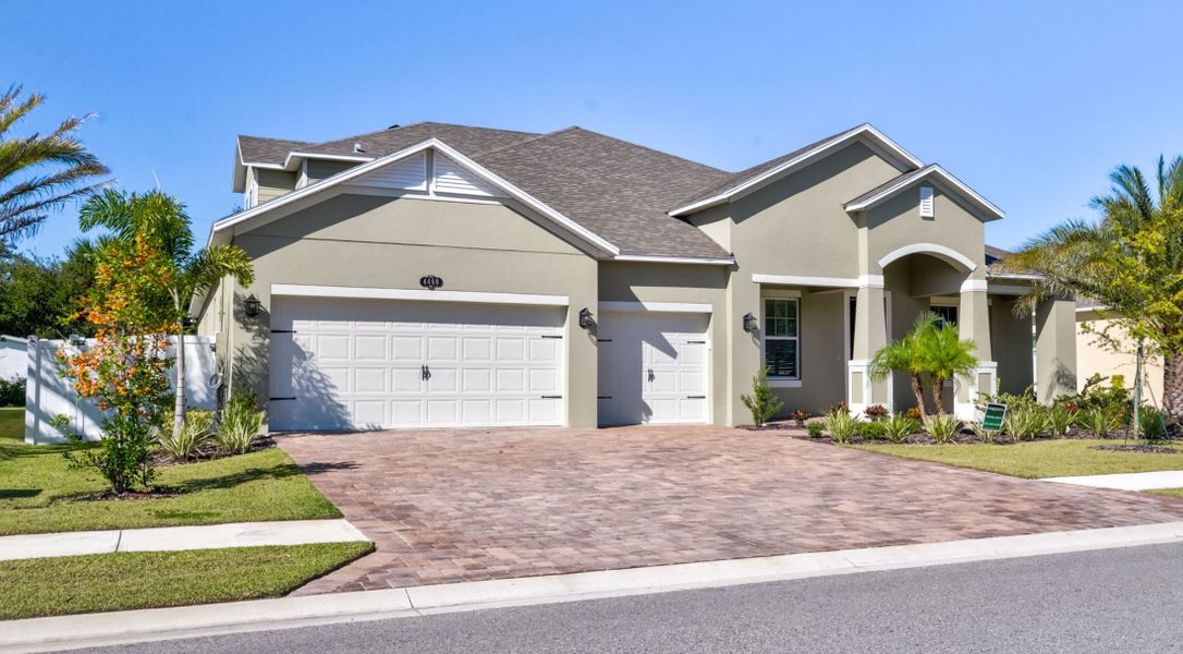 Front exterior of a home in the Rotonda community, located in Port Charlotte, FL (Image 2).