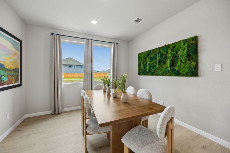 Dining Room in the Oak Model Home by Trophy Signature Homes