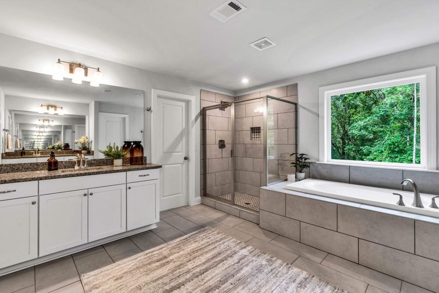 Furnished interior in a model home at The Estates at Hurricane Pointe in Douglasville (Image 42).