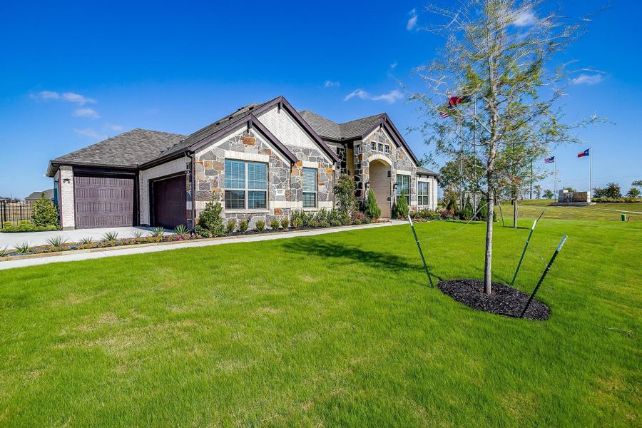 Front exterior of a home in the Creekview Farms community, located in Greenville, TX (Image 10).