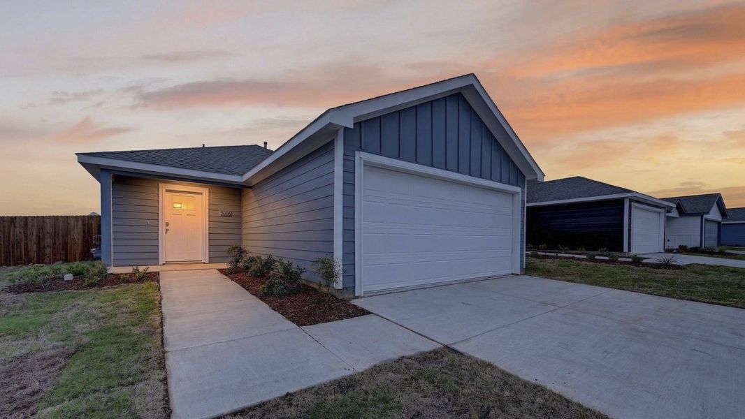Front exterior of a home in the The Hills of Sherman community, located in Sherman, TX (Image 10).