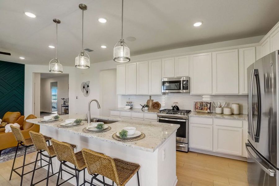 Furnished interior in a model home at Village at Three Oaks in Seguin (Image 15).