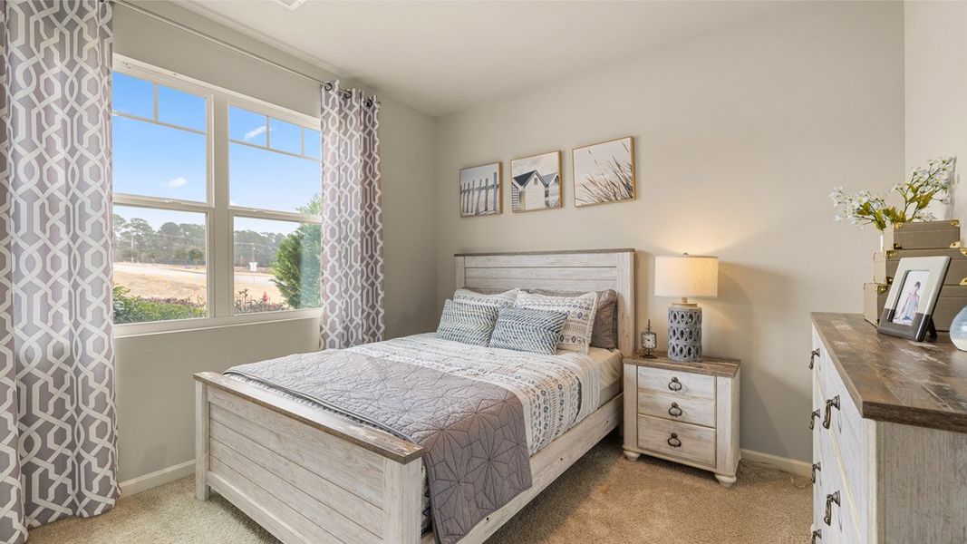 Furnished interior in a model home at Highland Hills in Graniteville (Image 7).