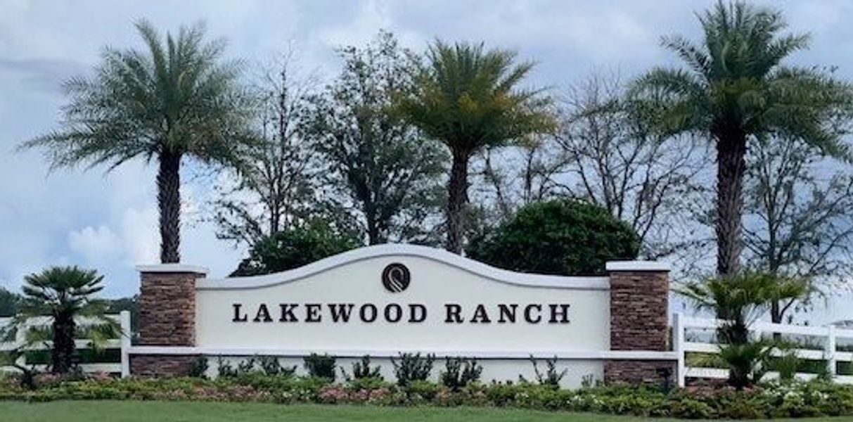 Entrance to the Palm Grove community in Bradenton, FL, featuring signage and landscaping (Image 15).