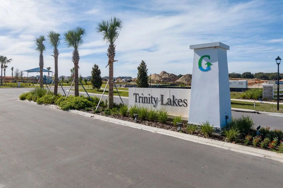 Main entrance to the Trinity Lakes master-planned community in Groveland, FL, featuring its landmark signage (Image 6).