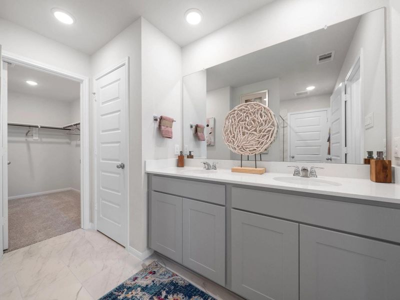 Furnished interior in a model home at Hill & Dale Ranch in Splendora (Image 13).