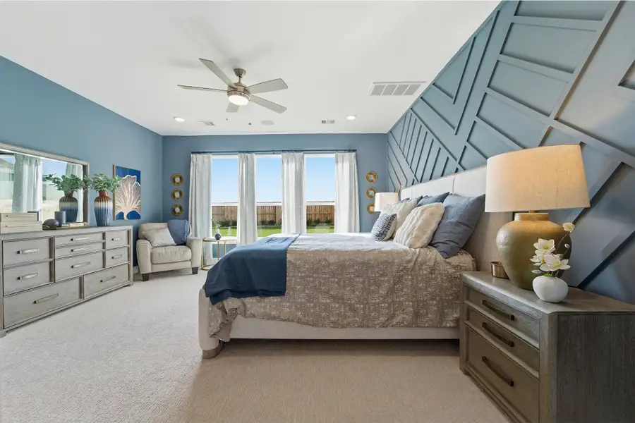 Furnished interior in a model home at Wildrye in Waller (Image 42).